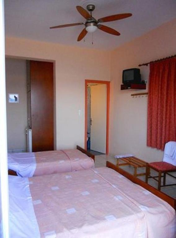 Apollon Hotel Tirós Pokoj fotografie